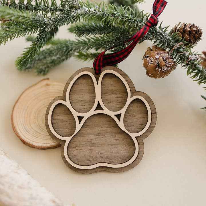 Dog Paw Christmas Ornament in Walnut by Woodlander Workshop