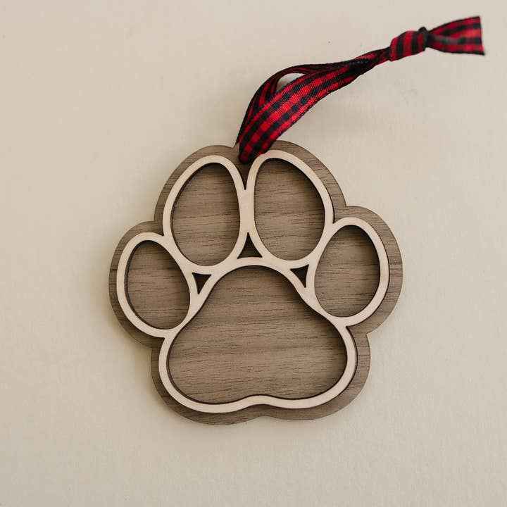 Dog Paw Christmas Ornament in Walnut by Woodlander Workshop