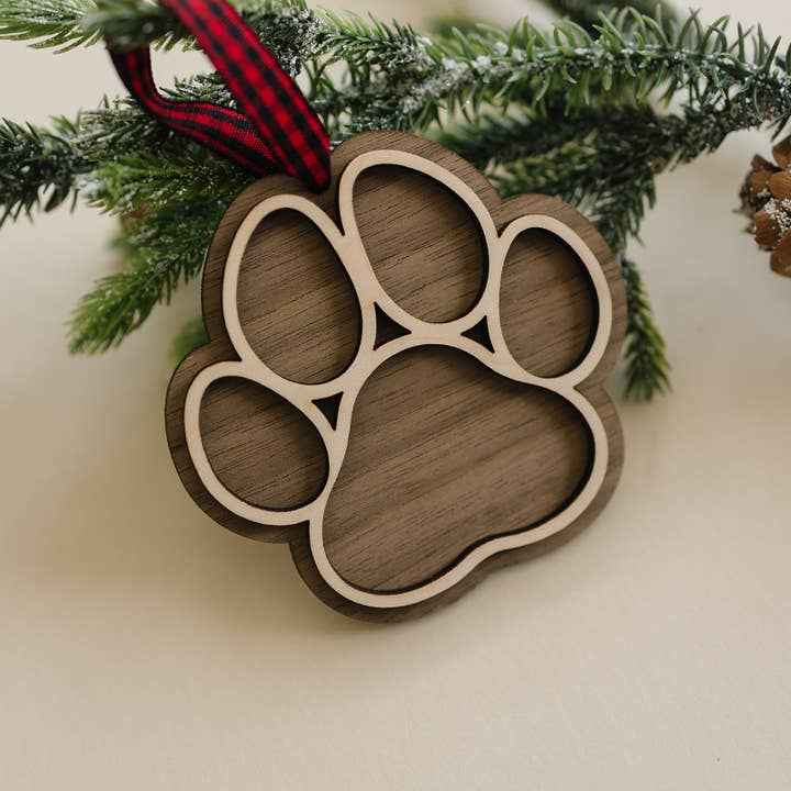 Dog Paw Christmas Ornament in Walnut by Woodlander Workshop